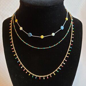 Beaded necklaces with gold accents